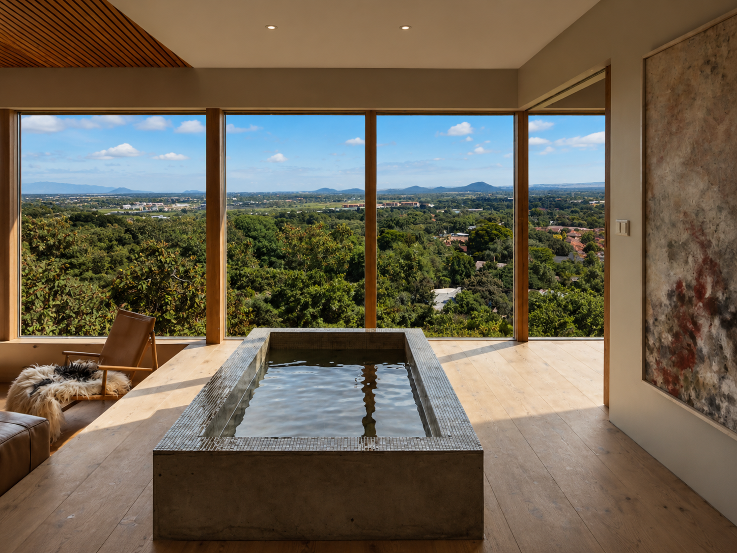 View from the bath — floor-to-ceiling glazing framing the Erf 993 Wonderboom landscape beyond